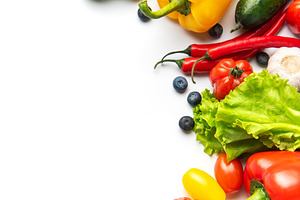 Fresh vibrant vegetables and fruits creating healthy eating bord, a Food & Drink Photo by Olena Rudo