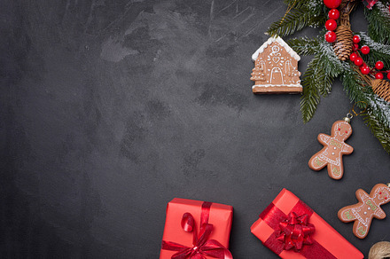 Christmas decor, gift red boxes on a black background, top view., a Holiday Photo by ndanko