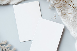 Blank white paper cards for winter holiday invitations or greeting mockups with, a Holiday Photo by Studio ANNA