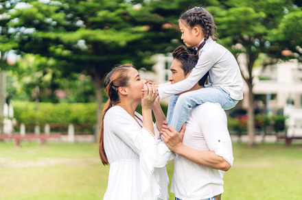 Portrait of enjoy happy love asian family father and mother hold, a Person Photo by Art_Photo