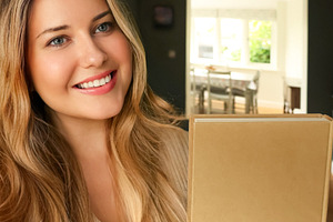 Happy woman receiving home delivery package, feeling joy and sat, a Person Photo by Studio ANNA