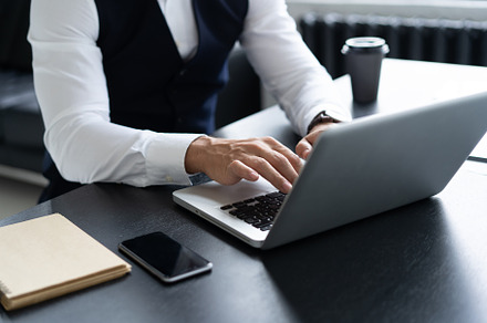 hands of business man using laptop, a Business Photo by OPOLJA