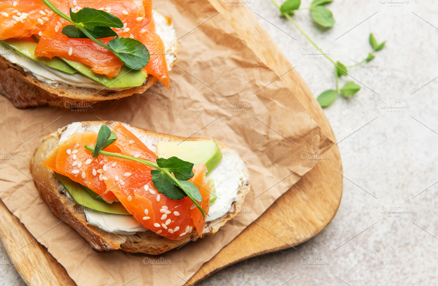 Salmon avocado toast with cream cheese and greens, a Food & Drink Photo by Olena Rudo