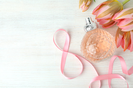 Concept of fragrant perfume, space for text, a Beauty & Fashion Photo by AtlasStudio
