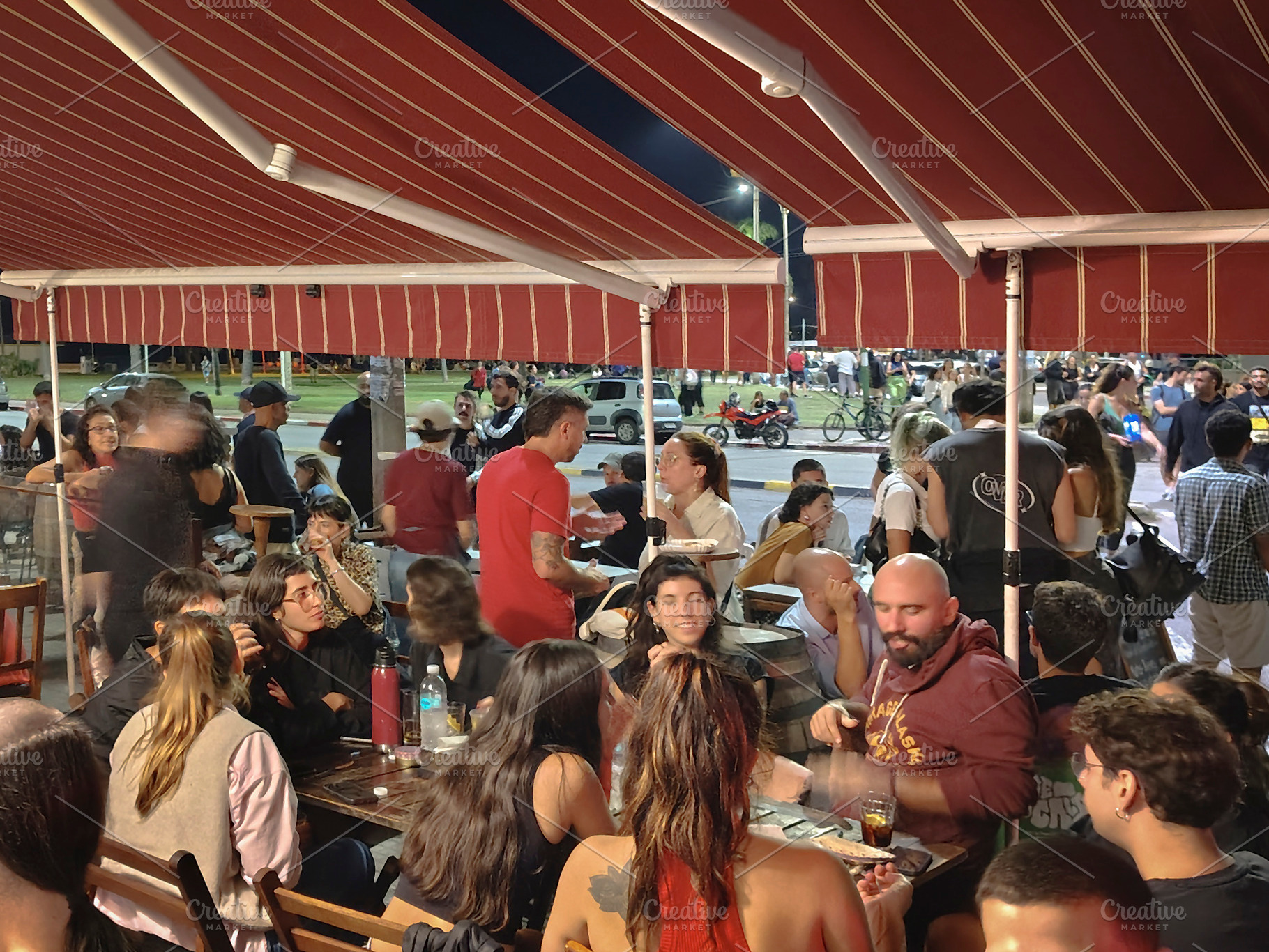 Crowd at bar at the historic ciudad vieja of montevideo, a Food & Drink Photo by DanFLCreativo