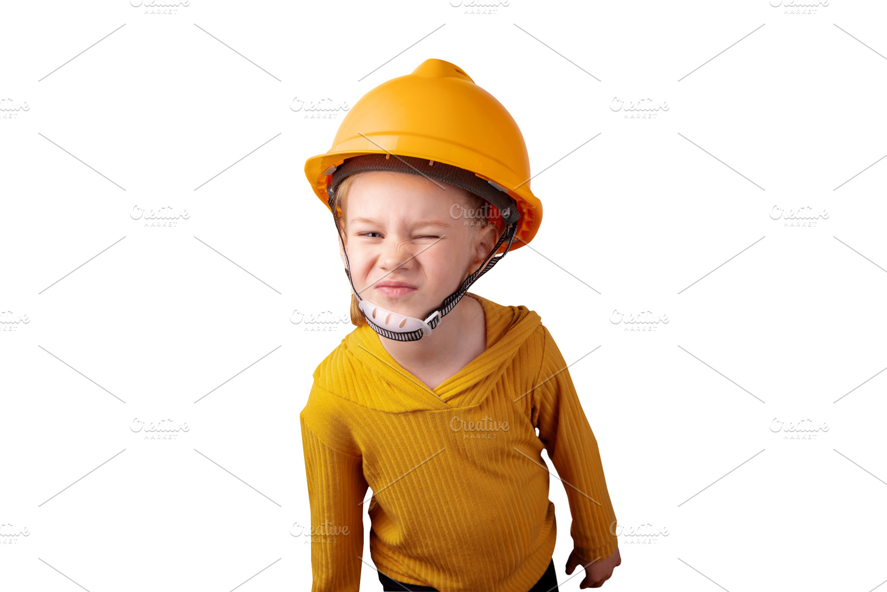 Smiling child wearing a yellow construction helmet and sweater,, a Person Photo by Ales Munt