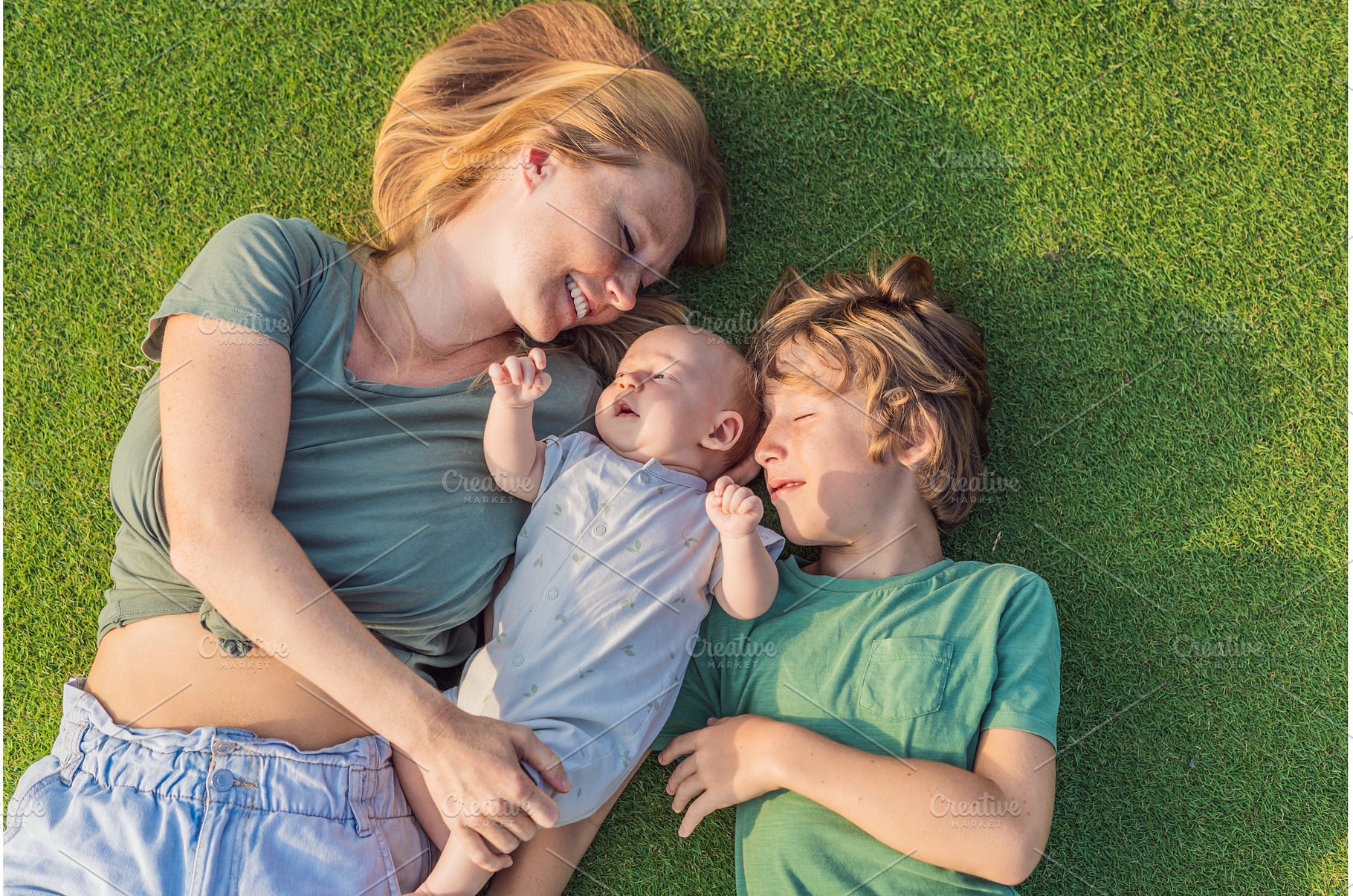 Mother, older son, and newborn baby, a Nature Photo by Elizaveta Galitskaya
