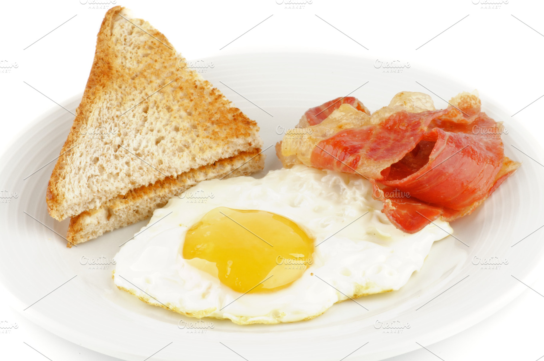 Bacon, eggs and toasts, a Food & Drink Photo by zhekos