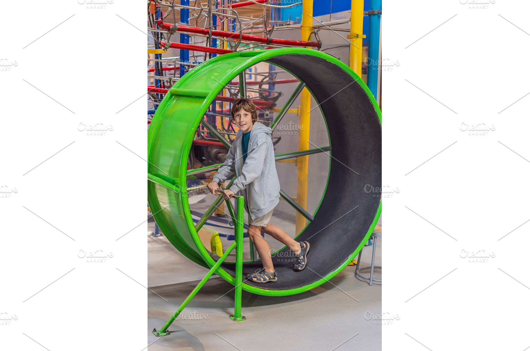 Teenage boy running inside a giant, a Sports & Recreation Photo by Elizaveta Galitskaya