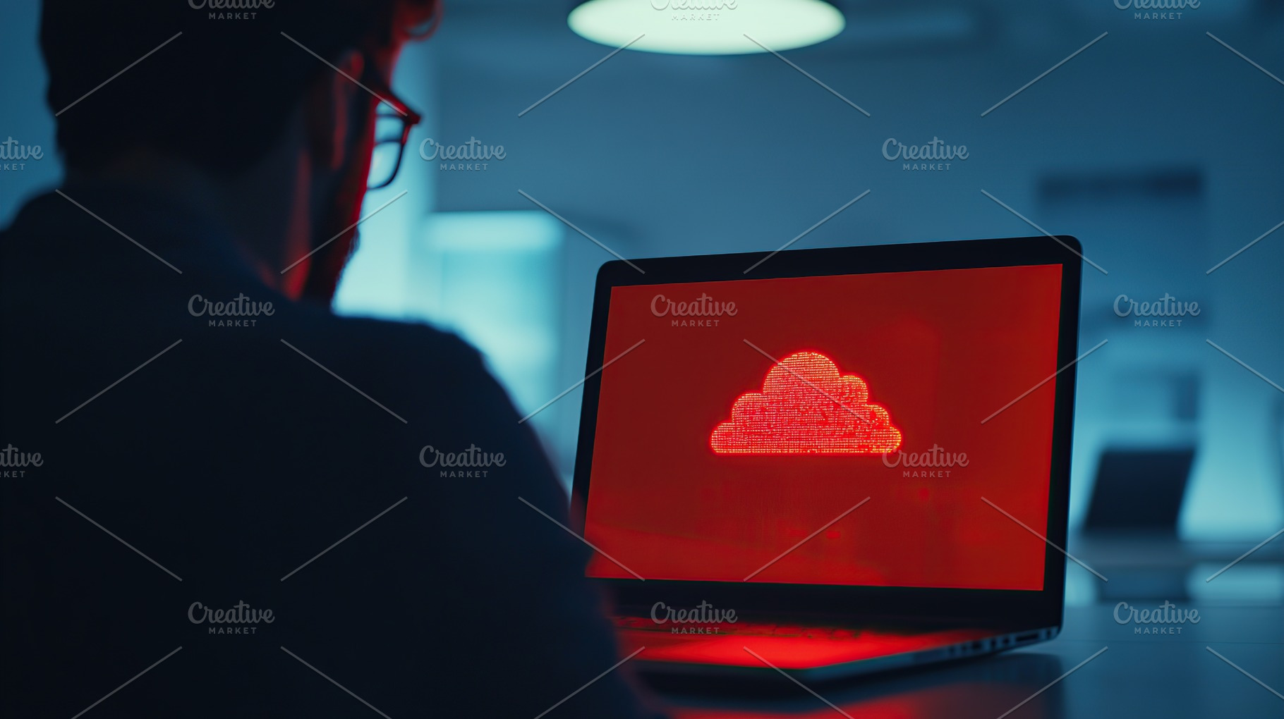 Programmer working on laptop after hack attack, cloud drive symbol, a Technology Photo by AlyaAnd