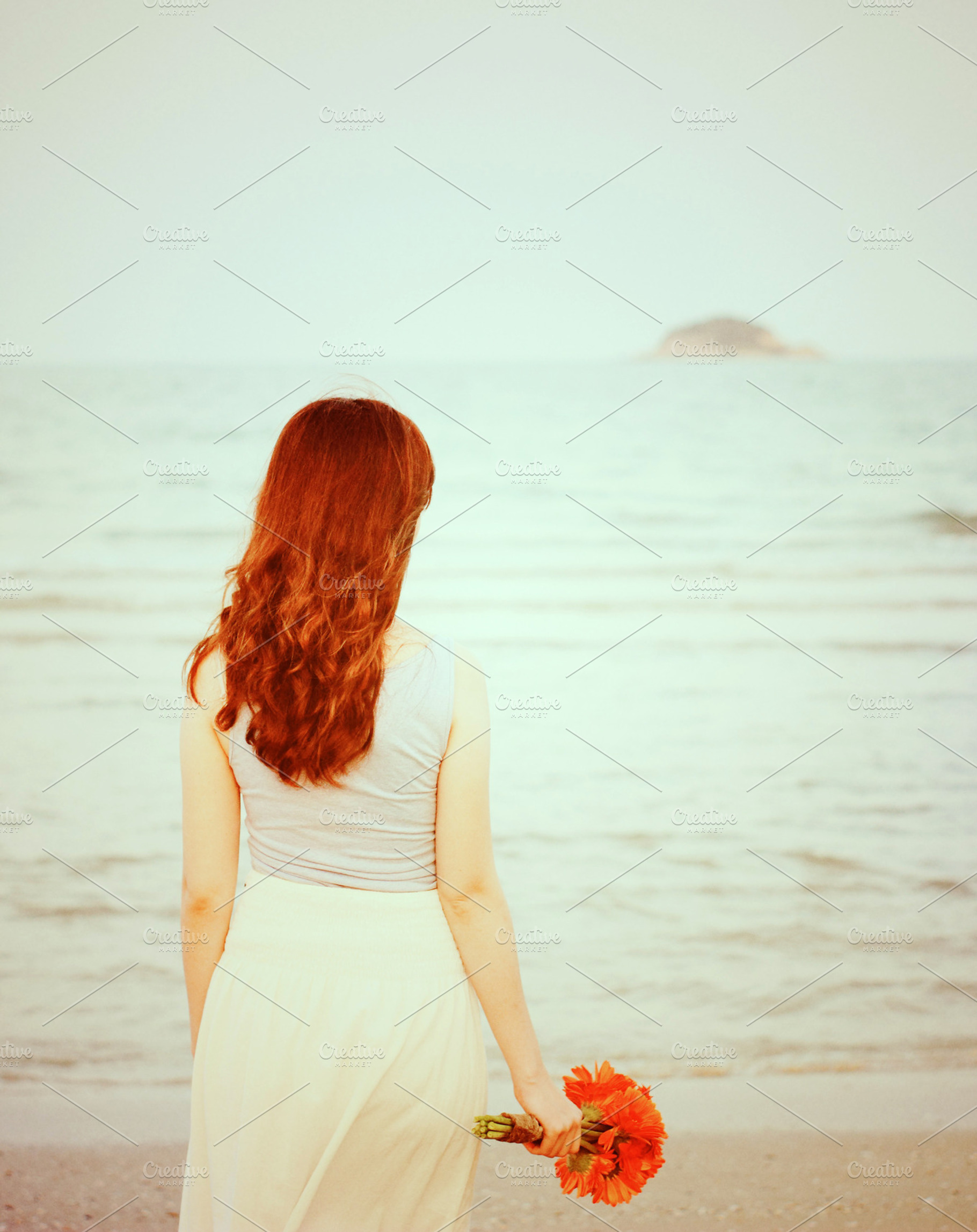 Young Beautiful Girl On The Beach