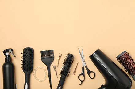 Composition with hairdresser accessories on beige background, sp, a Beauty & Fashion Photo by AtlasStudio PRO