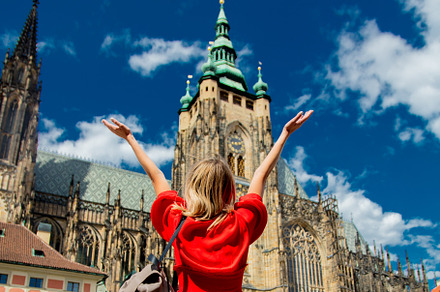 Beautiful girl in red dress travel in Prague,, a Person Photo by Masson Simon