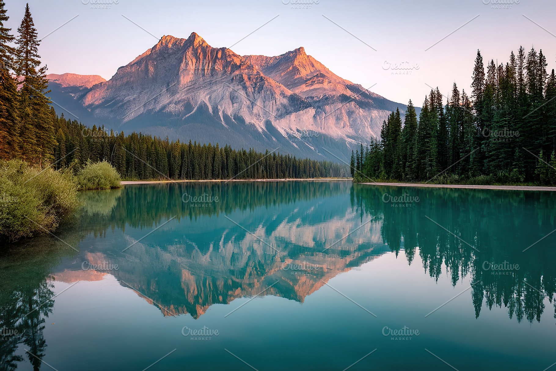 Mountain lake reflects lush forest and majestic peaks during golden hour, a Photo by AlyaAnd
