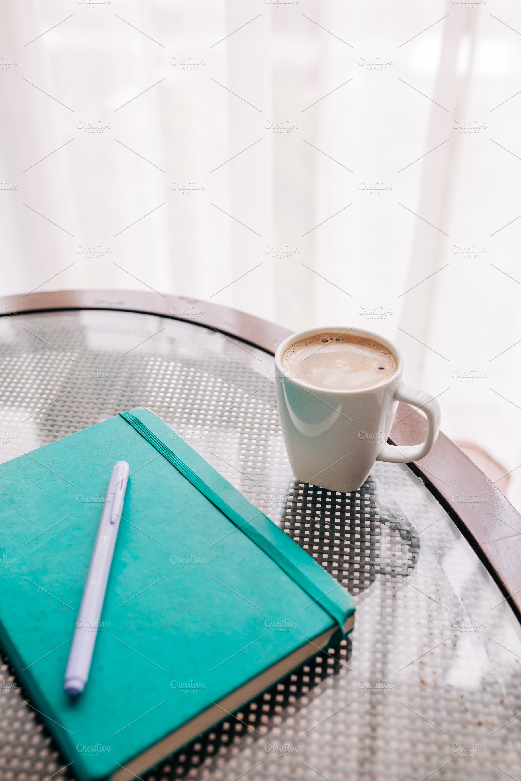 A view of a coffee and a notebook featuring creative, feminine, and pink, a Business Photo by Beach Babe Stock