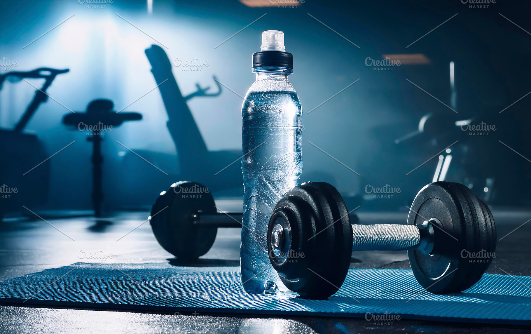 Barbell and drink on blue mat in gym blue backlit, a Sports & Recreation Photo by Davizro's Market