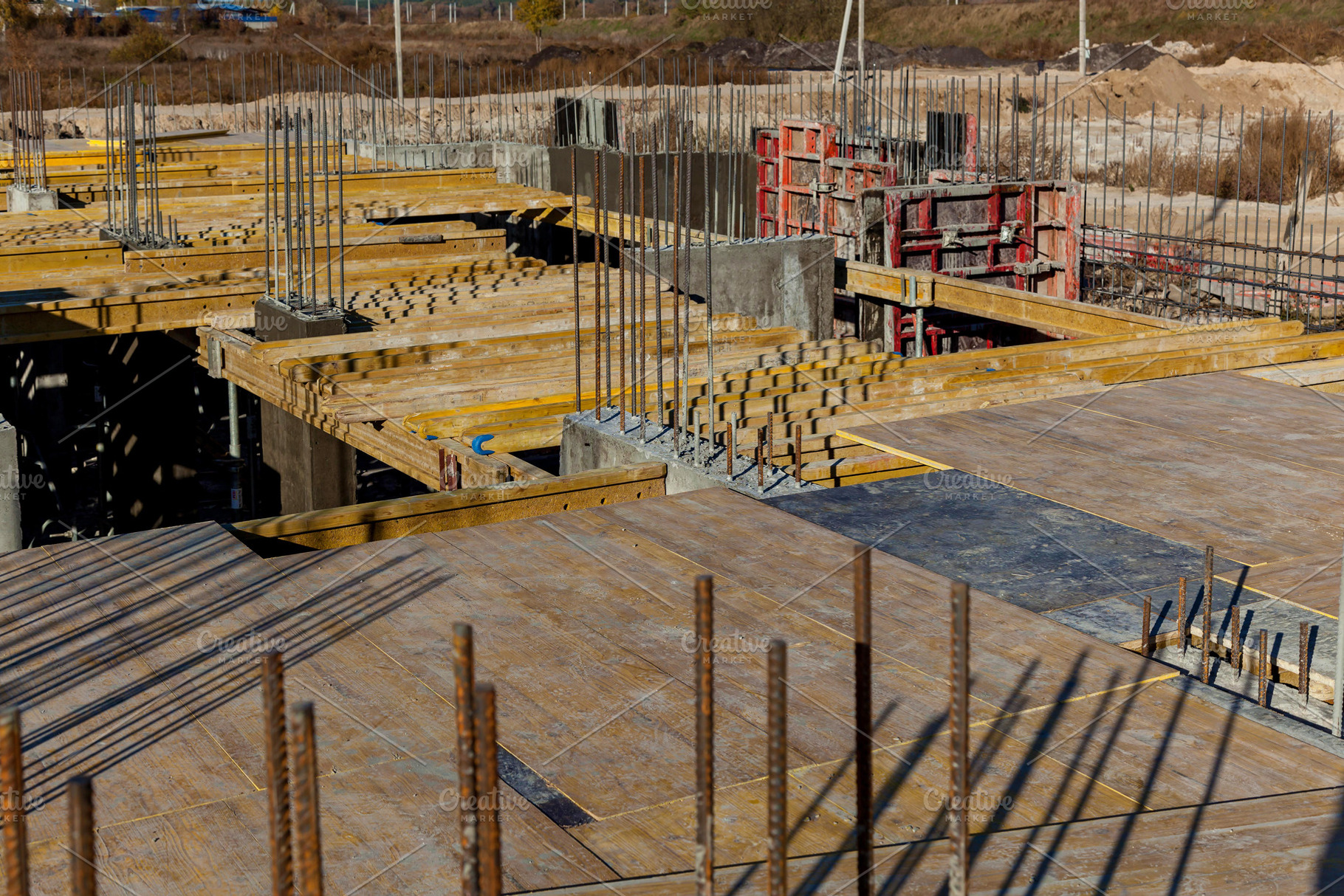 construction site with reinforced concrete structures, an Industrial Photo by Photostock