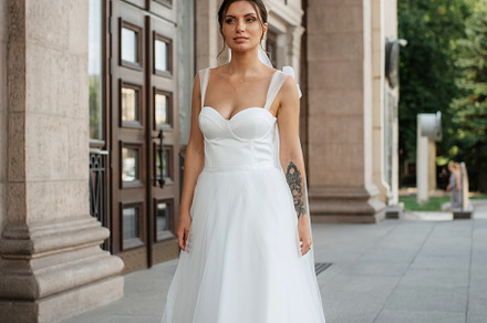 young woman bride in white dress, a Person Photo by Weddings, People, Travel