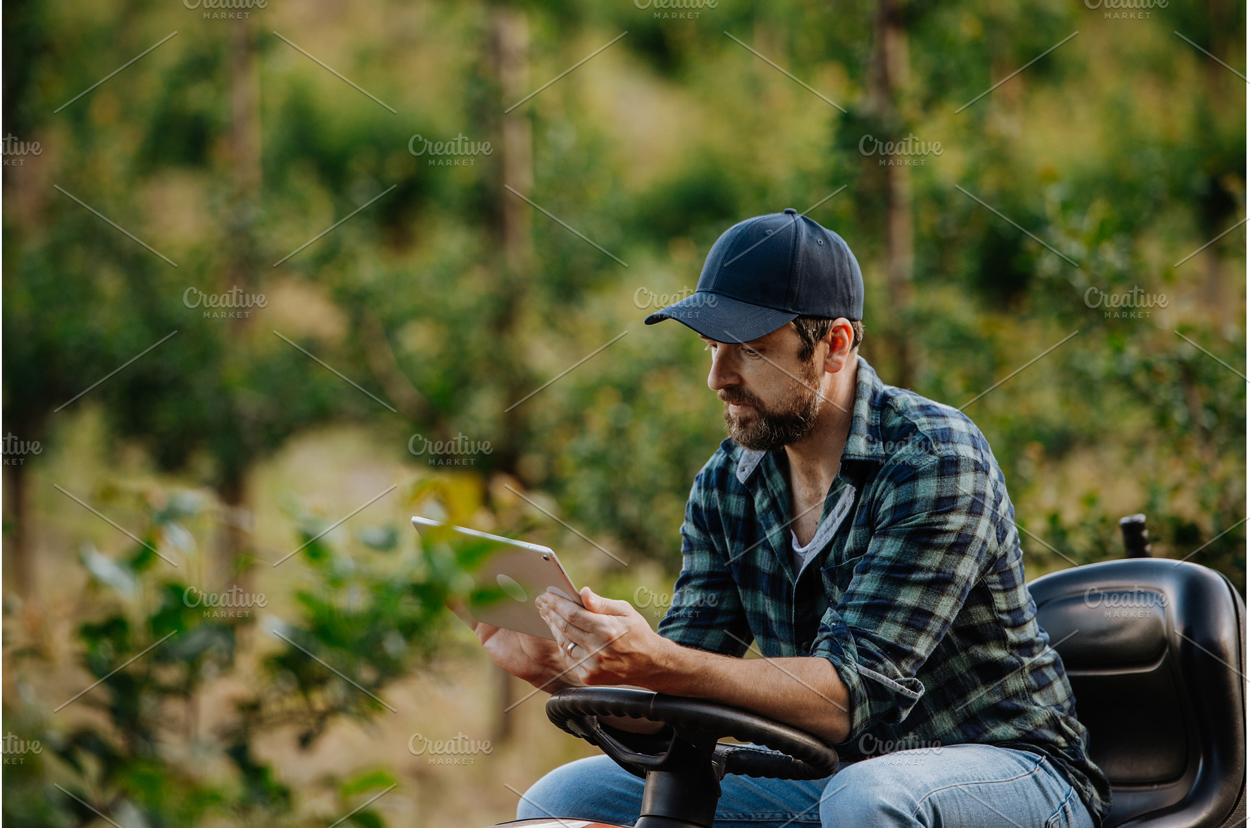 Farmer using digital tablet to, a Nature Photo by HalfPoint