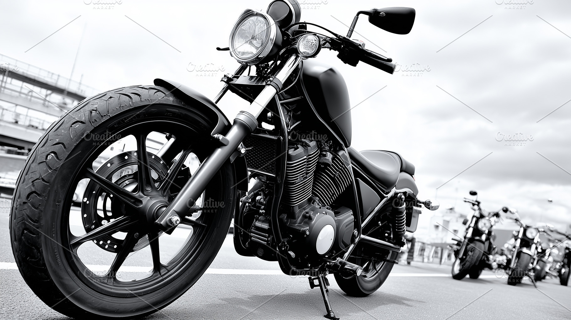 Black cruiser motorcycle parked on, a Transportation Photo by MistyDay