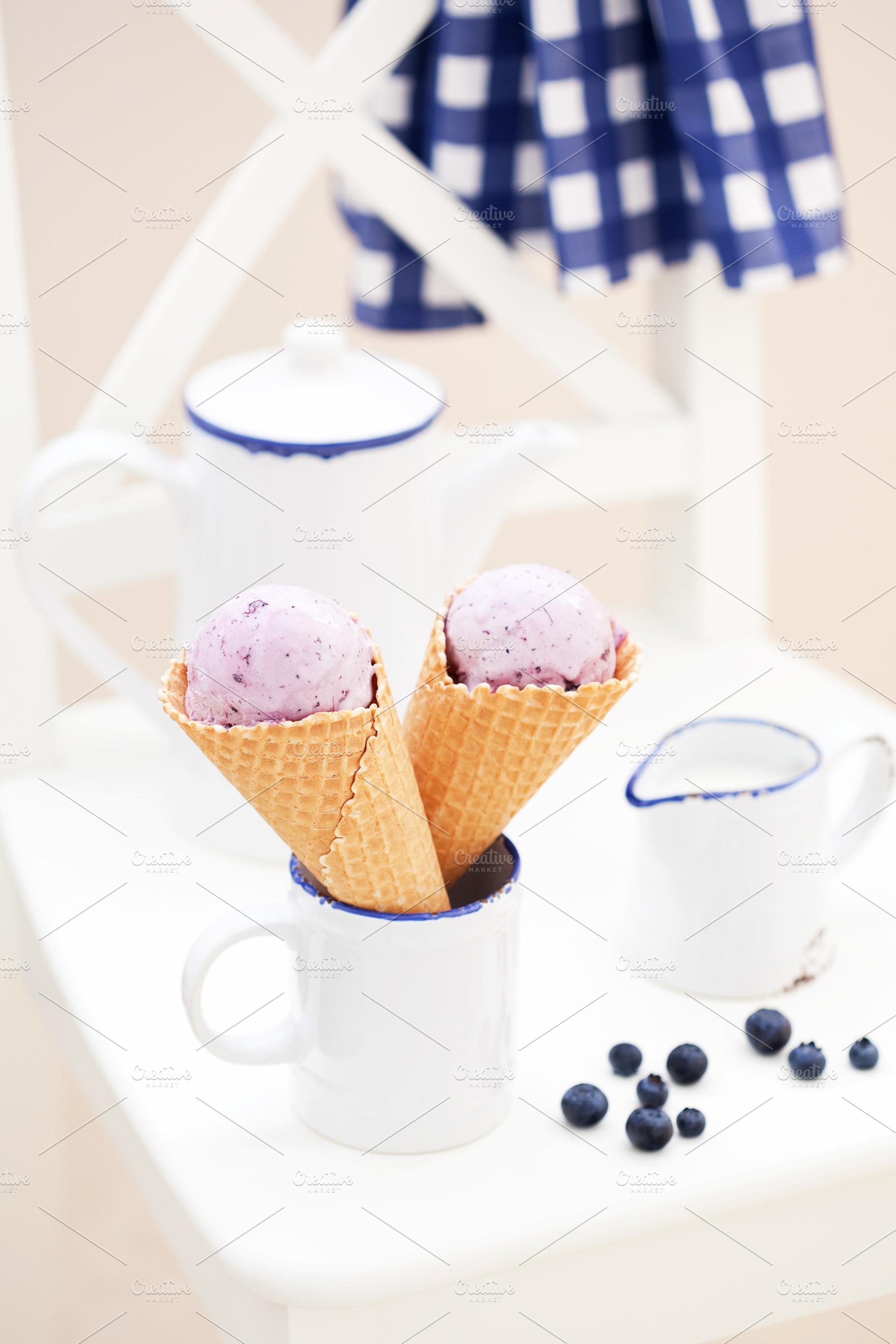 Blueberry ice cream containing berry, blueberry, and cone