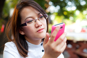 Women are looking mobile phone featuring adult, asia, and asian