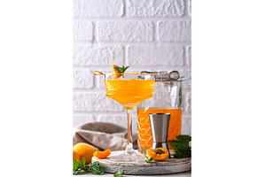 Fresh apricot Bellini cocktail with, a Food & Drink Photo by Yulia Furman