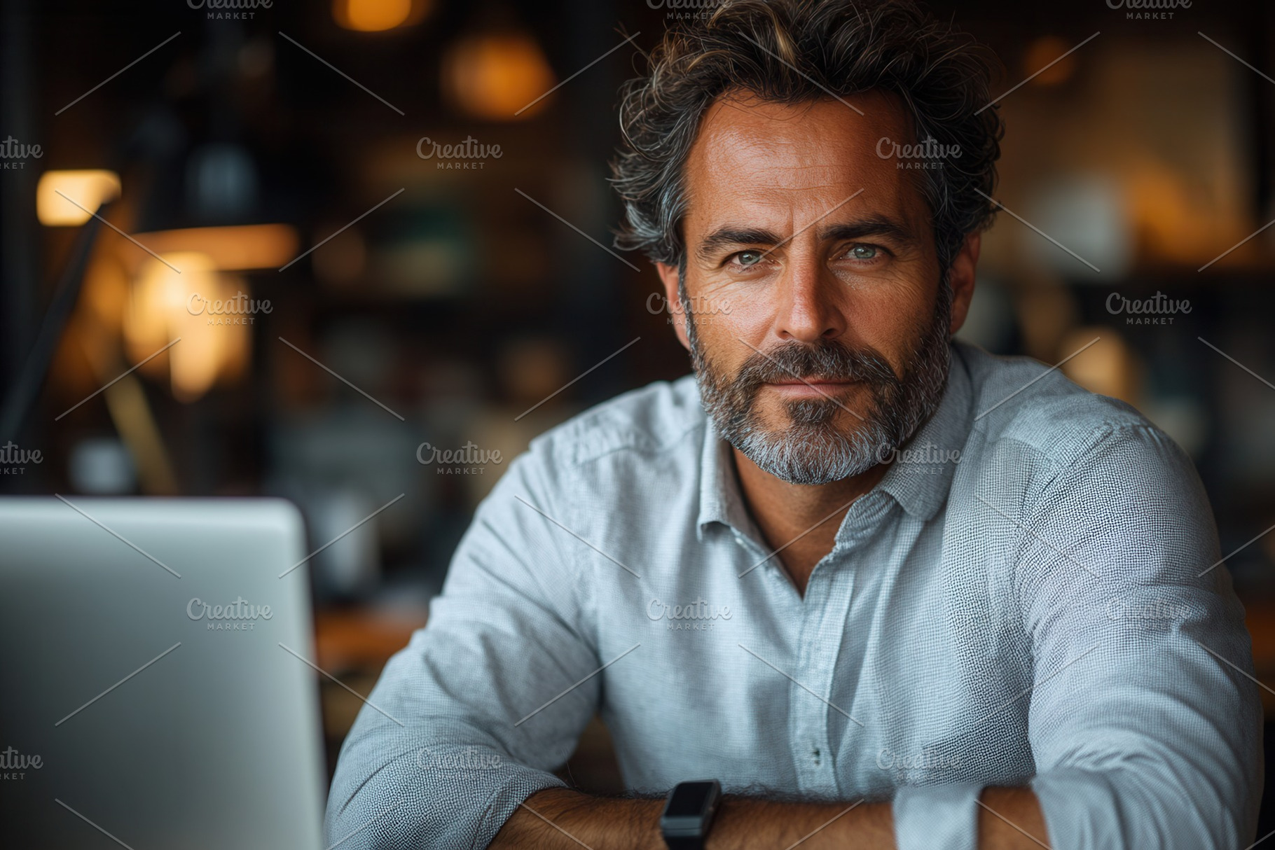 Professional man with beard working, a Photo by Tanuart