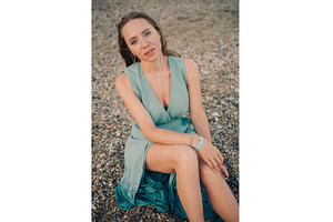 Woman in Flowing Dress on Seaside, a Person Photo by Jan Jack Russo Media