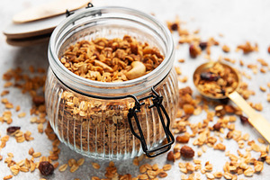 Granola with nuts and dry fruits for breakfast, a Food & Drink Photo by Olena Rudo