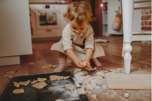 Toddler learning to bake holiday, a Holiday Photo by HalfPoint