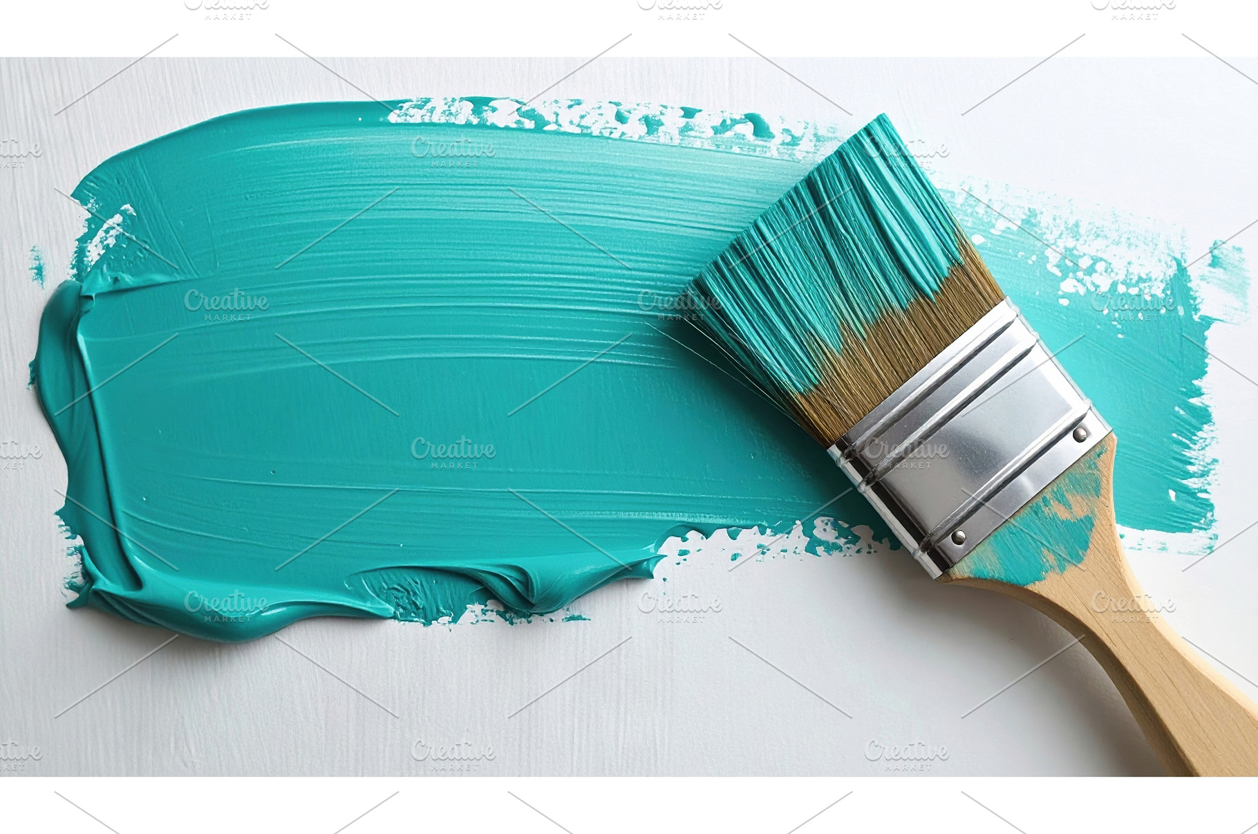 Turquoise paint stroke applied with, a Background Photo by Igor Tichonow
