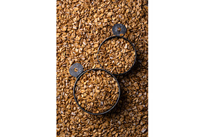 Texture of golden oats in metal, a Food & Drink Photo by Yulia Furman