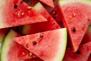 Raw Organic Watermelon Slices on a Plate, top view. Close-up., a Food & Drink Photo by LiudmylaChuhunova