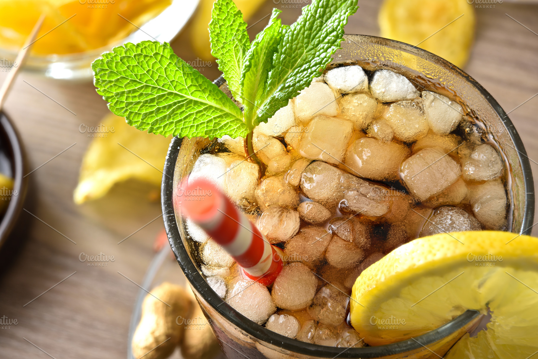 Detail of refreshing cola drink on table with snacks, a Food & Drink Photo by Davizro's Market
