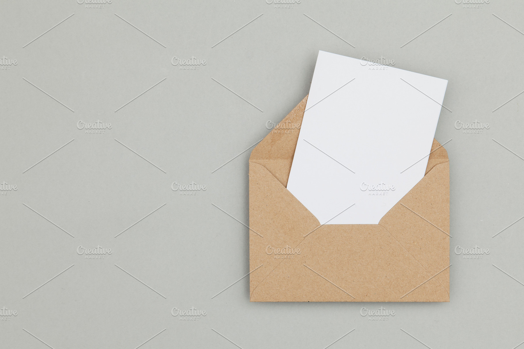 Blank white card with brown envelope, a Background Photo by ink drop