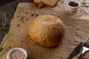 Round sesame seed bun, a Photo by Grafvision photography