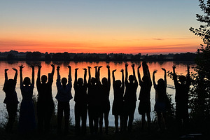 A vibrant sunset, a Person Photo by Imaginarium