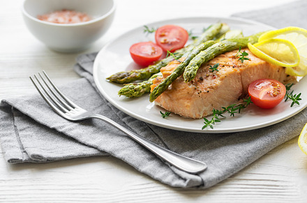 Baked Delicious salmon, green asparagus on  plate, a Food & Drink Photo by Olena Rudo