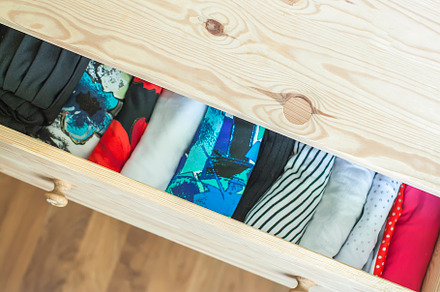 Wooden dresser drawer with clothes, a Beauty & Fashion Photo by pictures for you