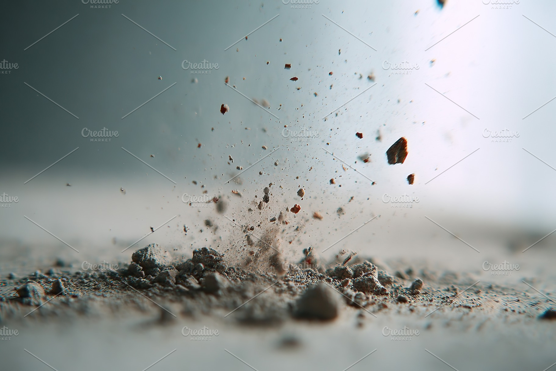 Dust particles scatter in the air after a sudden impact on a concrete surface, a Photo by AlyaAnd