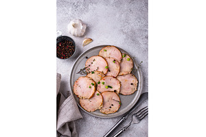 Sliced chicken sausage with herbs, a Food & Drink Photo by Yulia Furman