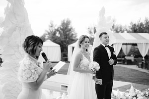 wedding ceremony of the bride and groom in a restaurant against, a Person Photo by Weddings, People, Travel