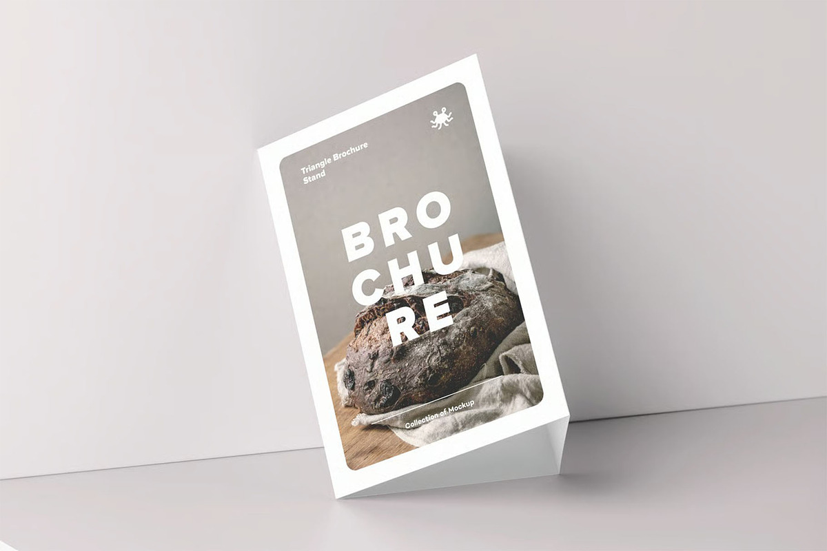 Triangle A5 Brochure Stand Mock-up, an Advertising Mockup by zippypixelstudio (Photo 8 of 10)
