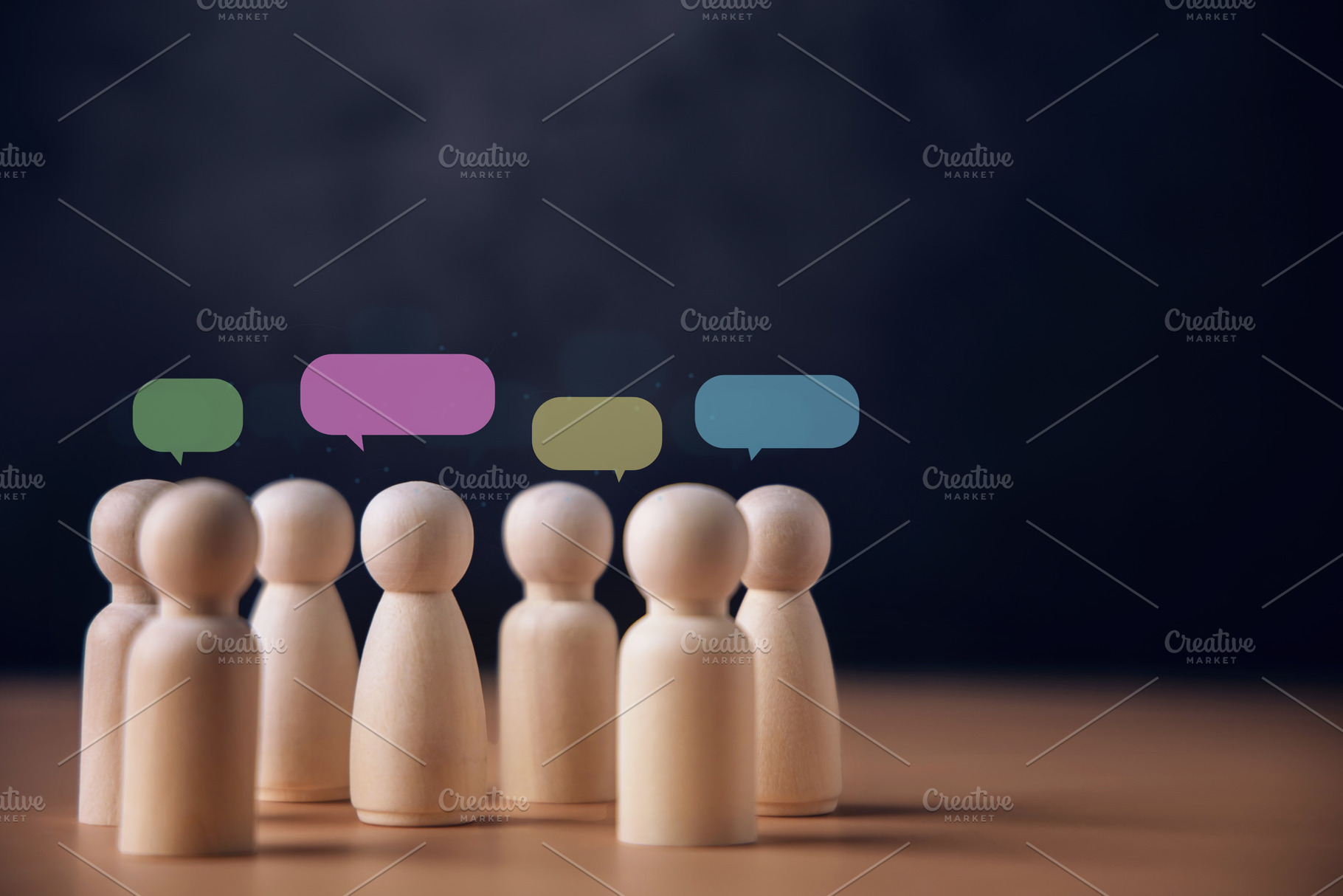 Wooden peg dolls with colorful speech bubbles, communication, Sp, a Photo by salmon.black
