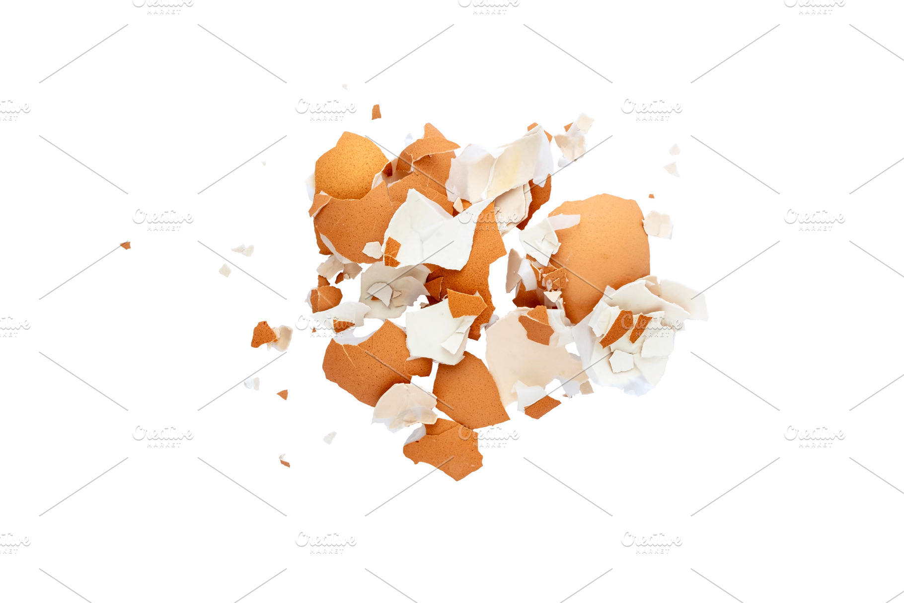 Pile of broken eggshell isolated, a Food & Drink Photo by BOOCYS