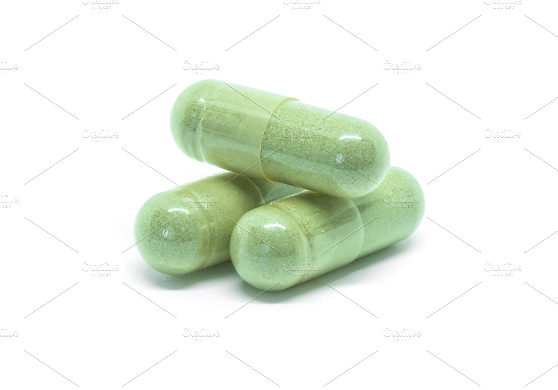 Herb capsule isolated on white background, a Health & Medical Photo by Nednapa