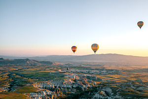 Hot air balloons over the valley featuring cappadocia, balloon, and air