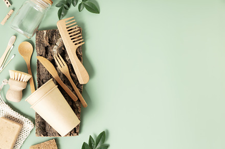 Set of eco-friendly tableware and cleaning products on pastel gr, an Abstract Photo by Natalia Klenova's Shop