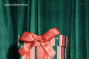 Christmas Gift on Gloved Hand Mockup, a Packaging Mockup by creatsy5 (Thumbnail 4 of 6)